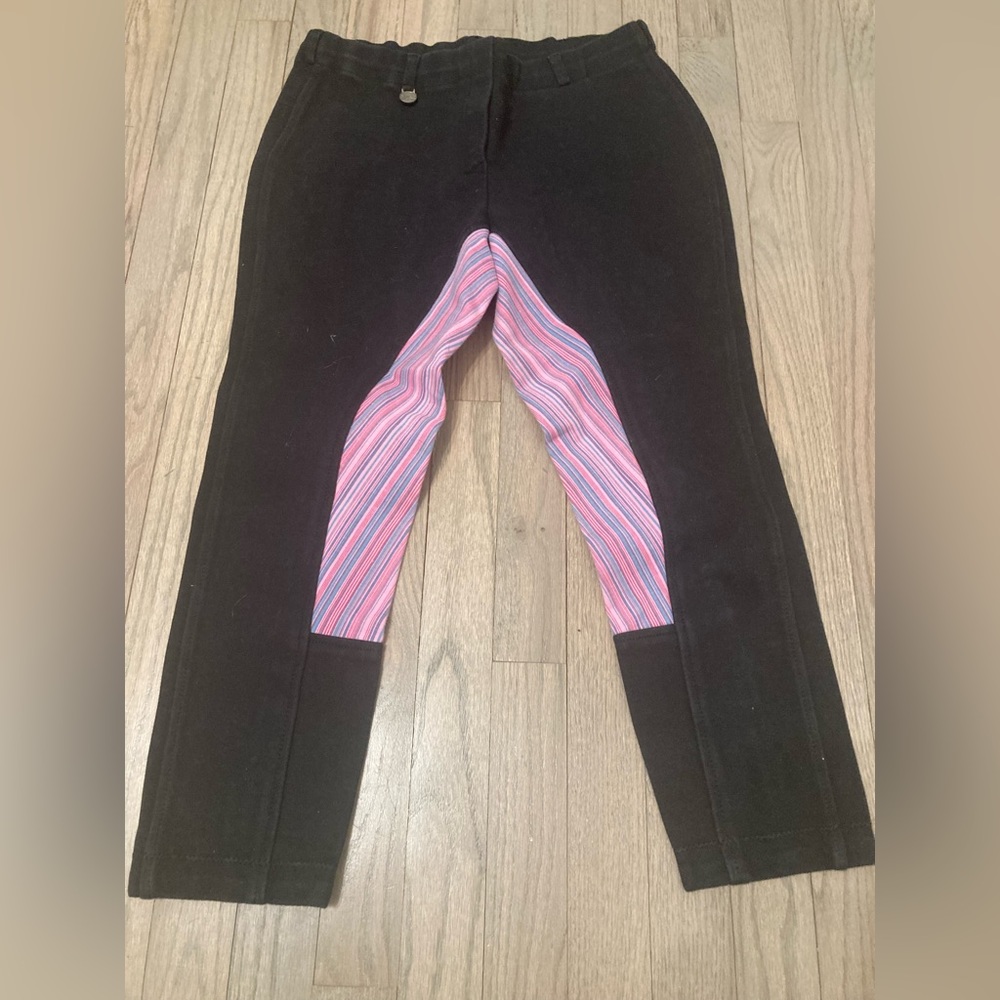 Black and pink Ovation riding breeches size 27.